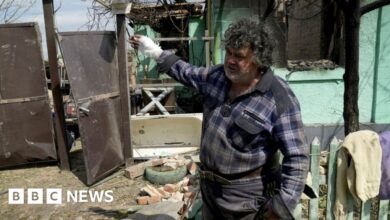 Serhii, a resident of Vovchansk shows his destroyed home