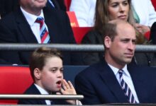 Prince William and Prince George arrive at the match between Manchester City and Manchester United