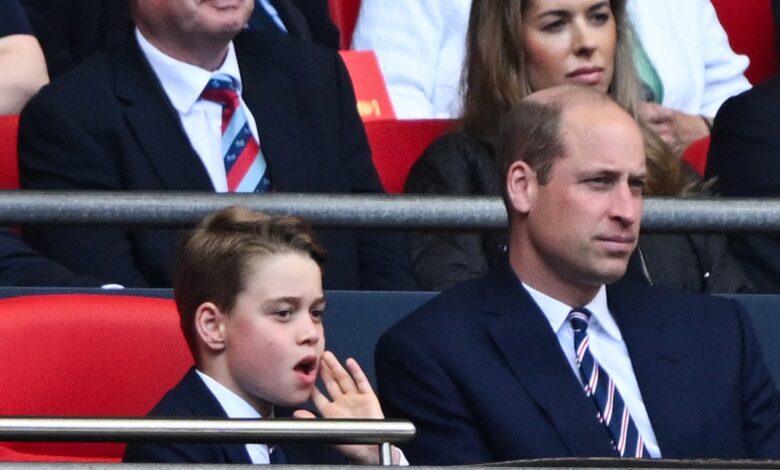 Prince William and Prince George arrive at the match between Manchester City and Manchester United
