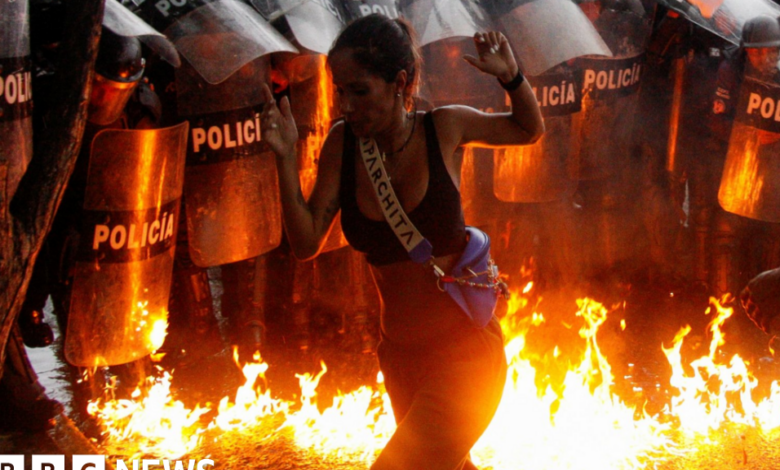 Protesters march toward the presidential palace after Maduro declares victory