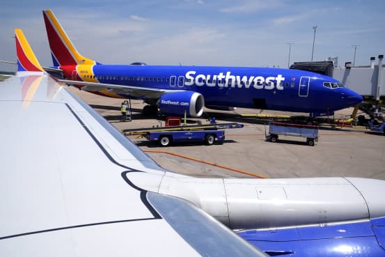 Southwest raises revenue forecast, plans share buybacks in activist battle