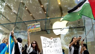 Protesters flock to Apple stores around the world on iPhone 16 launch day