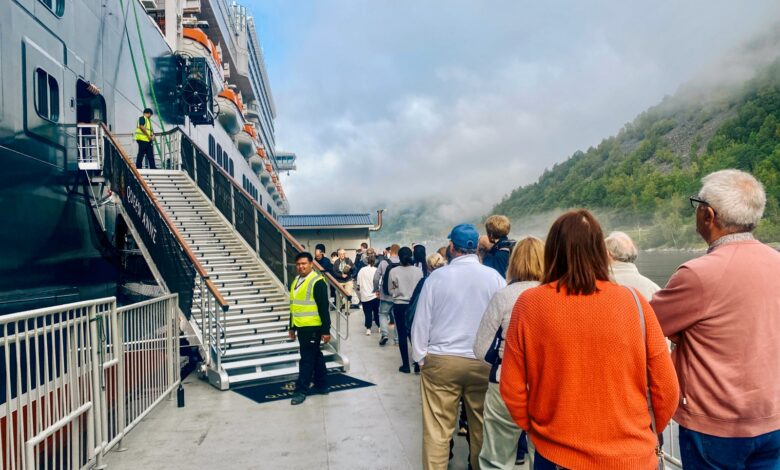 Passengers boarding the Cunard ship Queen Anne in Norway