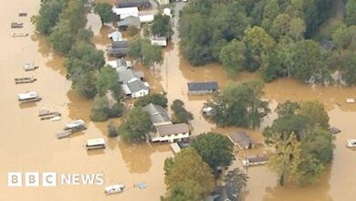 Drone footage of torn up roads in flooded North Carolina