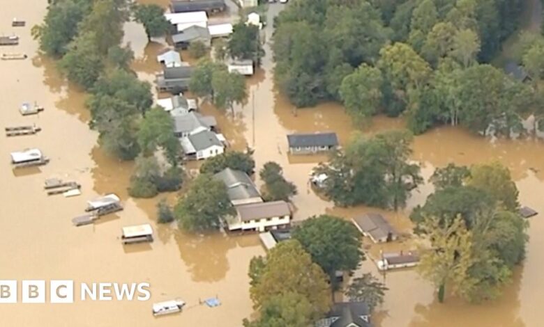 Drone footage of torn up roads in flooded North Carolina