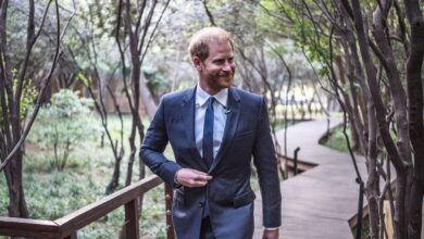 Prince Harry surfs with Kelly Slater at the artificial wave facility