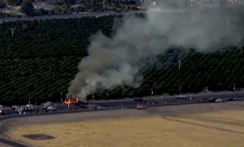 A boy died after a commercial plane aborted takeoff, crashed through an airport fence and hit a car