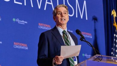 Scott Bessent speaks at a podium during the National Conservative Conference in Washington