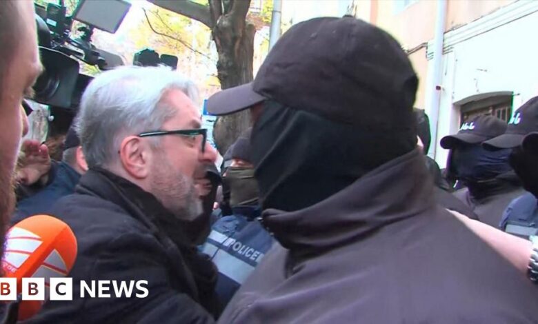 The leader of the Georgian opposition was dragged out of the party office by police