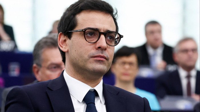 Stéphane Séjourné is seen attentively listening during a plenary session of the European parliament