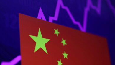 A Chinese flag and a stock graph are seen in this illustration