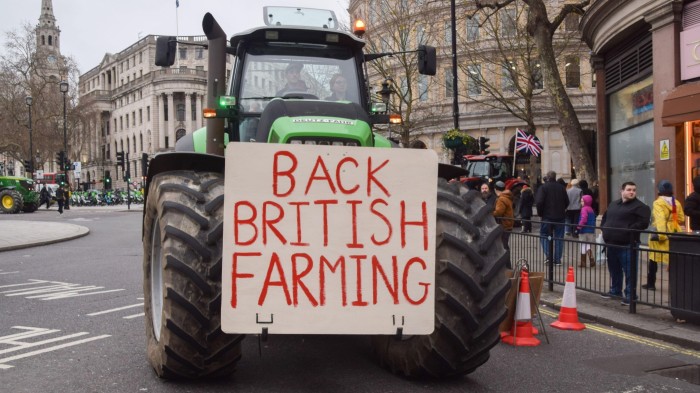 Tractors drive through Trafalgar Square as farmers stage a protest against inheritance tax in Westminster